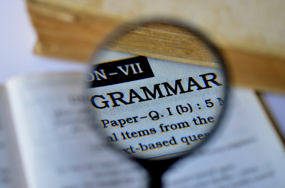 Magnifier glass on grammer