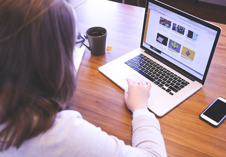 Women using laptop to choose effective images