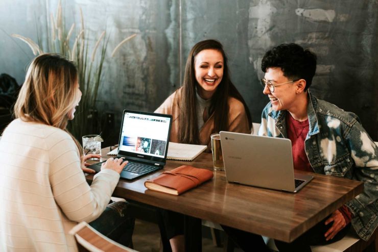 stock photo showing team at a computer